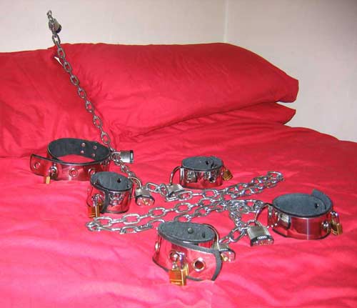 Pic 5, the restraints on the bed, locked to the wall. 